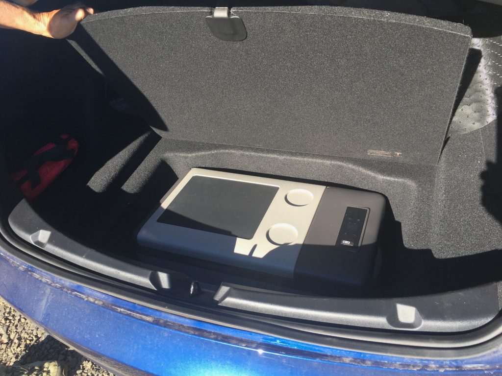 ACOPOWER P15 fridge in the trunk of a Tesla Model 3.